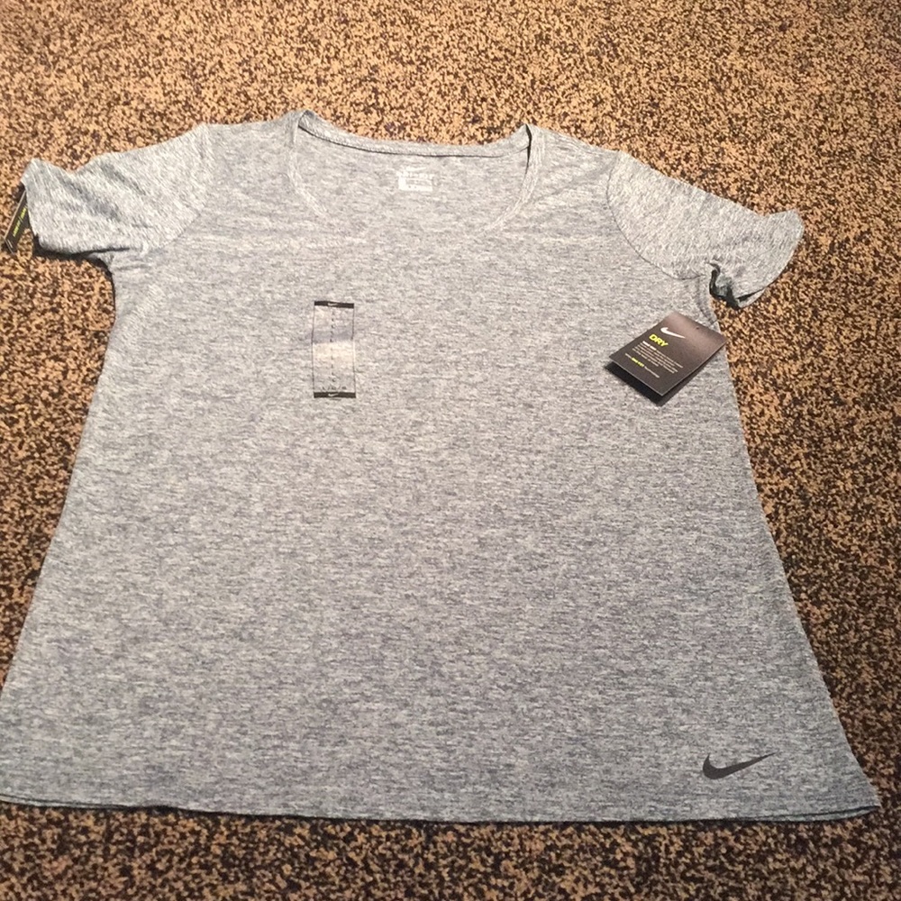 Women’s Nike size large Dri-Fit shirt. NWT.